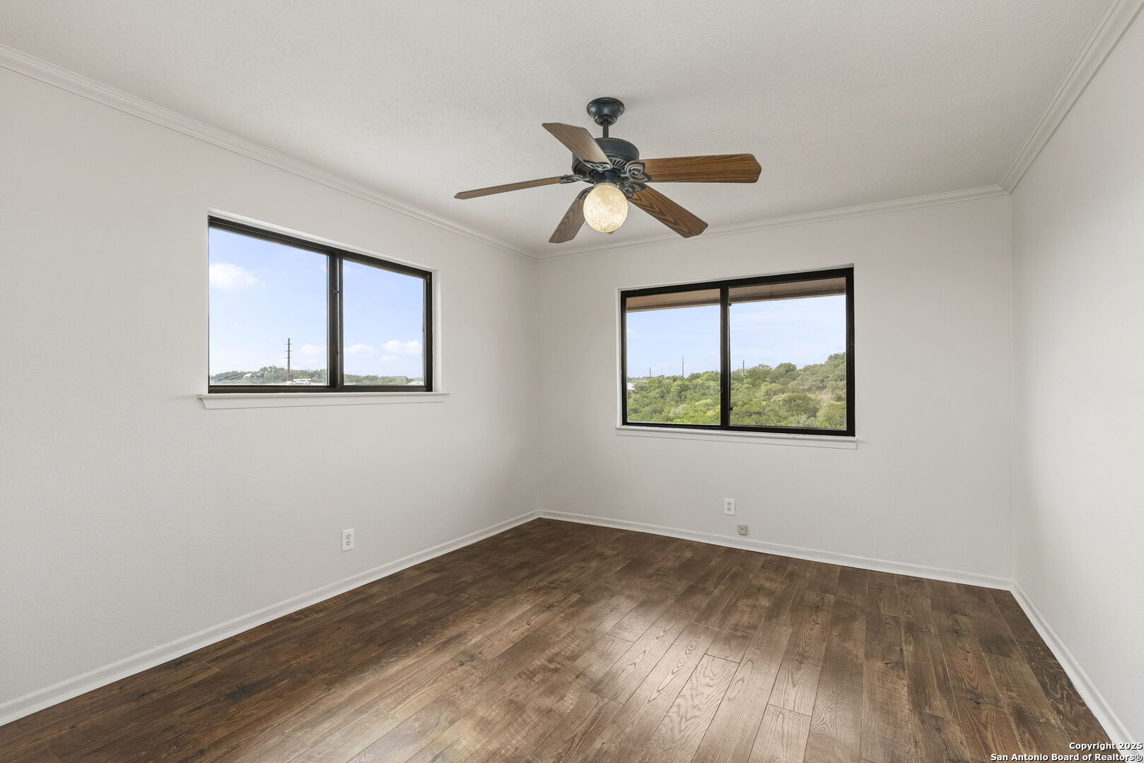 26938 Karsch Road Boerne, TX 78006 - Photo 34 of 60 a view of empty room with wooden floor and fan