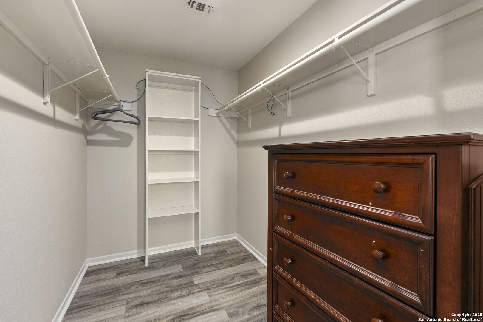 26938 Karsch Road Boerne, TX 78006 - Photo 36 of 60 a view of walk in closet with empty racks