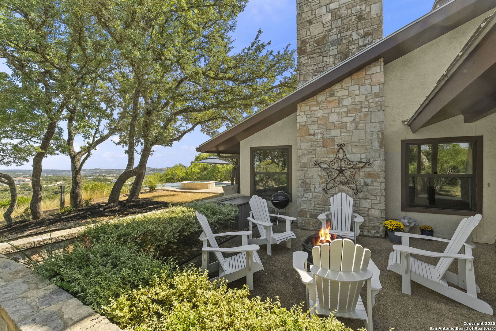 26938 Karsch Road Boerne, TX 78006 - Photo 38 of 60 a view of backyard with outdoor seating and green space