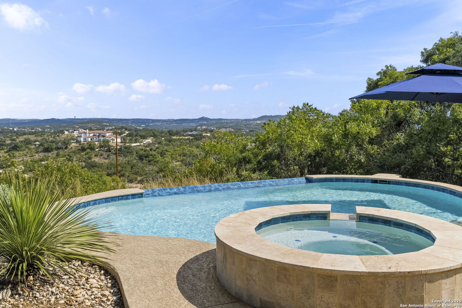 26938 Karsch Road Boerne, TX 78006 - Photo 40 of 60 a view of a swimming pool with a yard