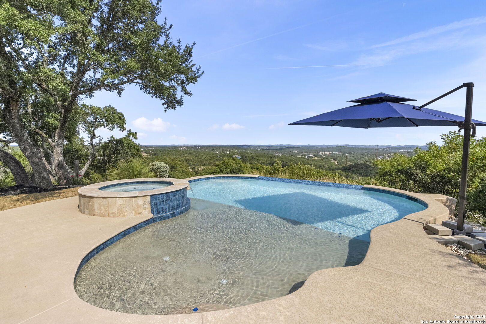 26938 Karsch Road Boerne, TX 78006 - Photo 4 of 60 a view of a swimming pool with an outdoor seating