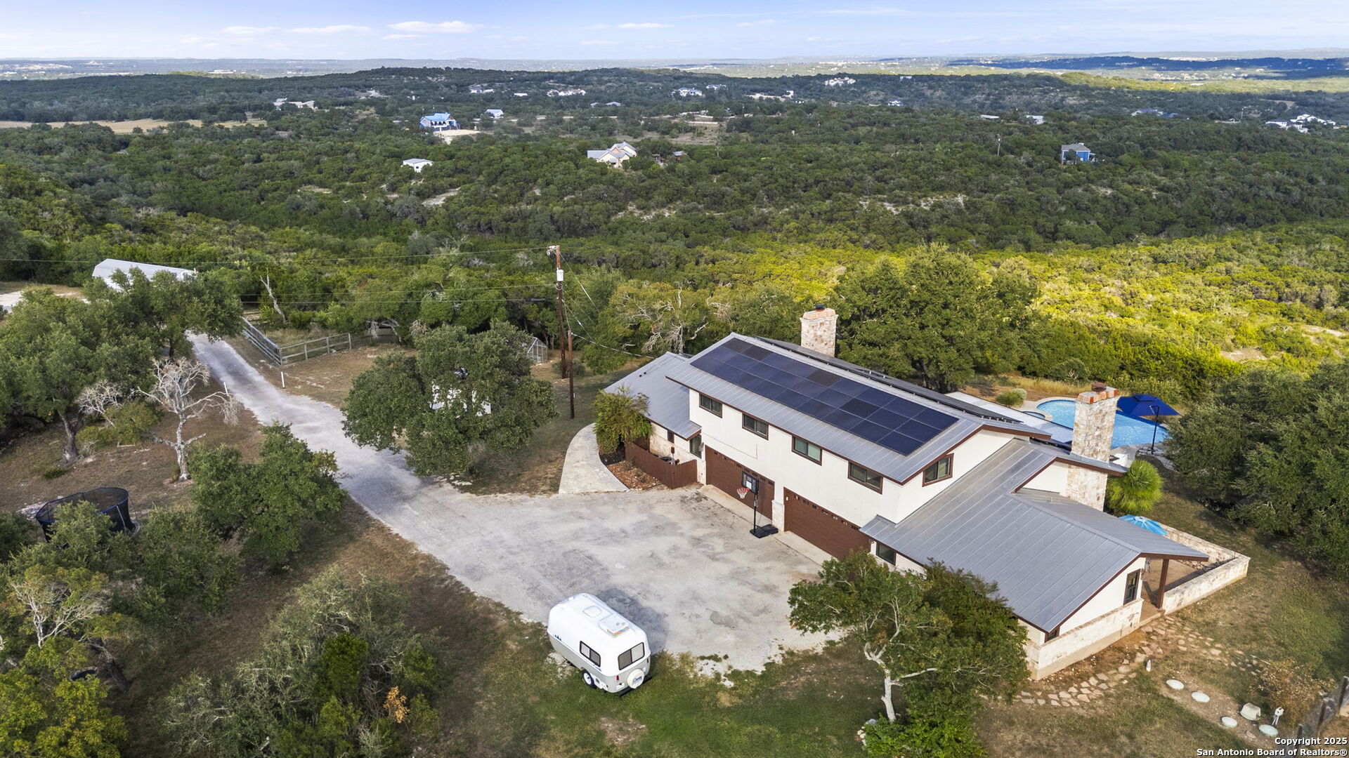 26938 Karsch Road Boerne, TX 78006 - Photo 43 of 60 an aerial view of a house with a lake view