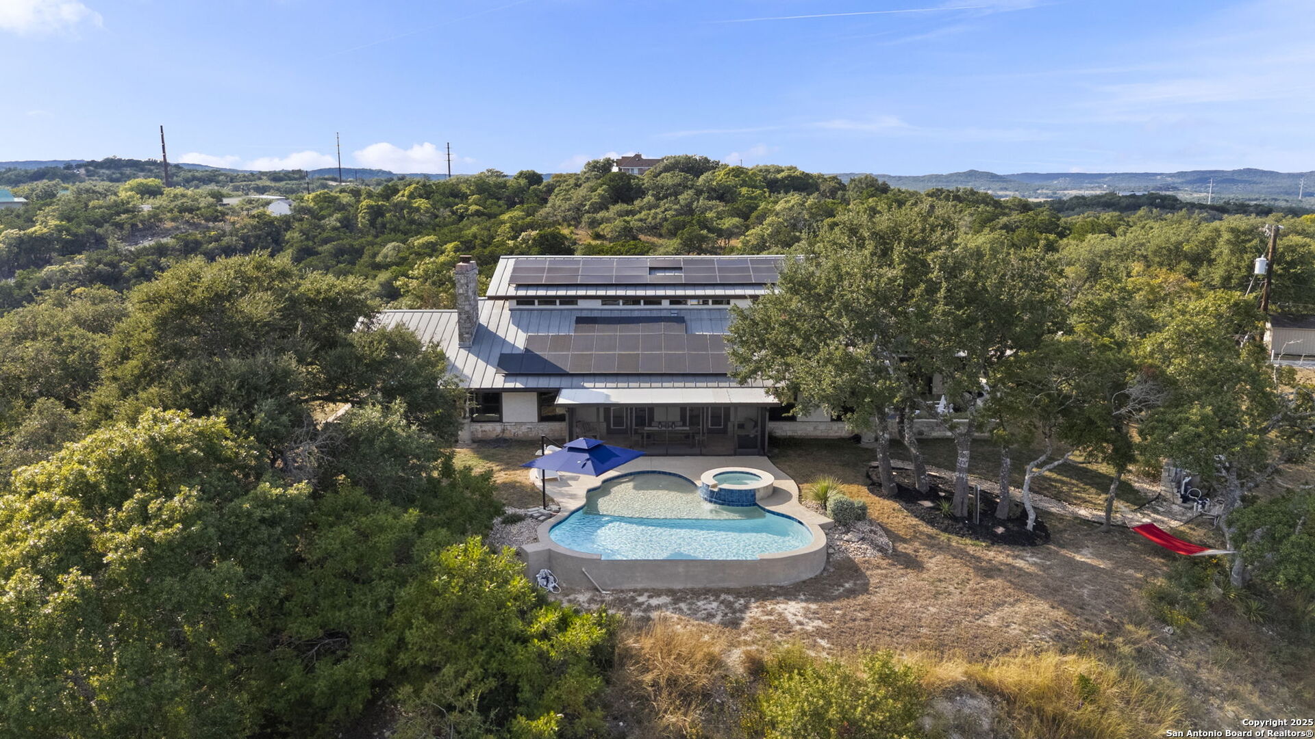 26938 Karsch Road Boerne, TX 78006 - Photo 51 of 60 a view of a water with a mountain in the background