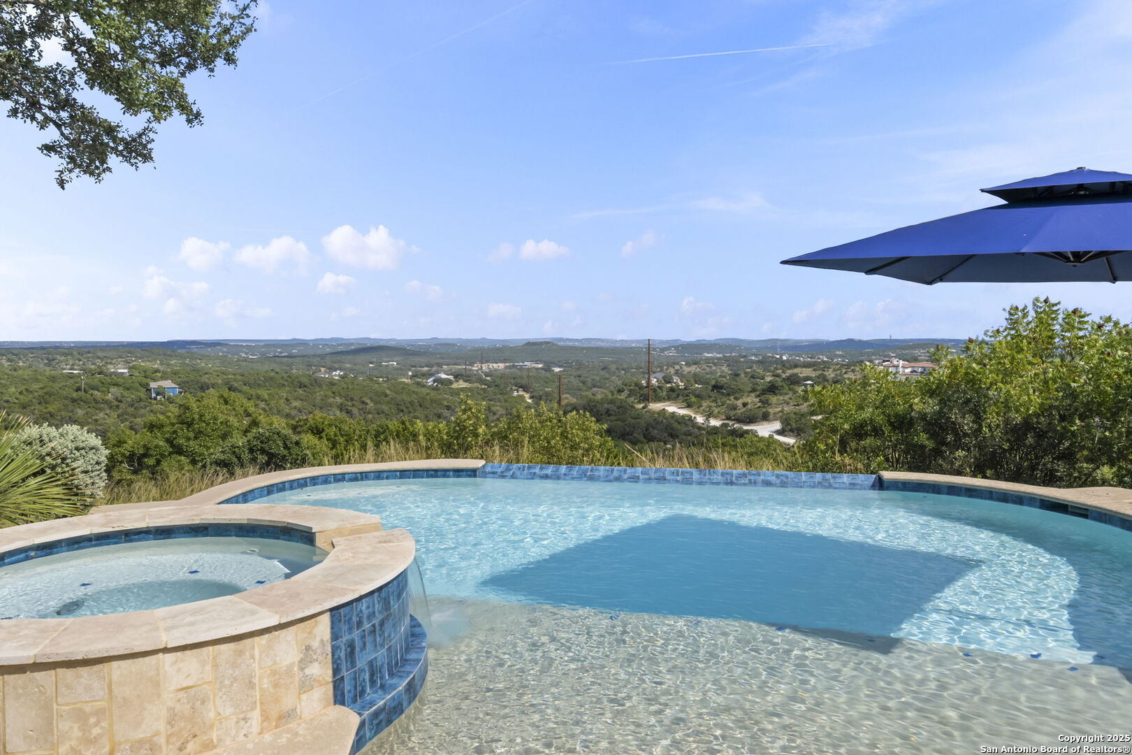 26938 Karsch Road Boerne, TX 78006 - Photo 56 of 60 a view of a swimming pool with an outdoor seating