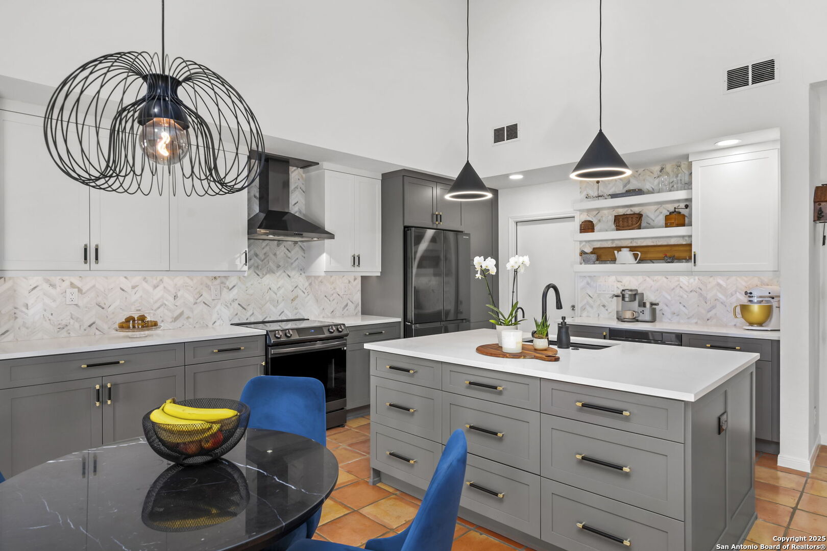 26938 Karsch Road Boerne, TX 78006 - Photo 9 of 60 a kitchen with stainless steel appliances granite countertop a sink a stove and a wooden floors