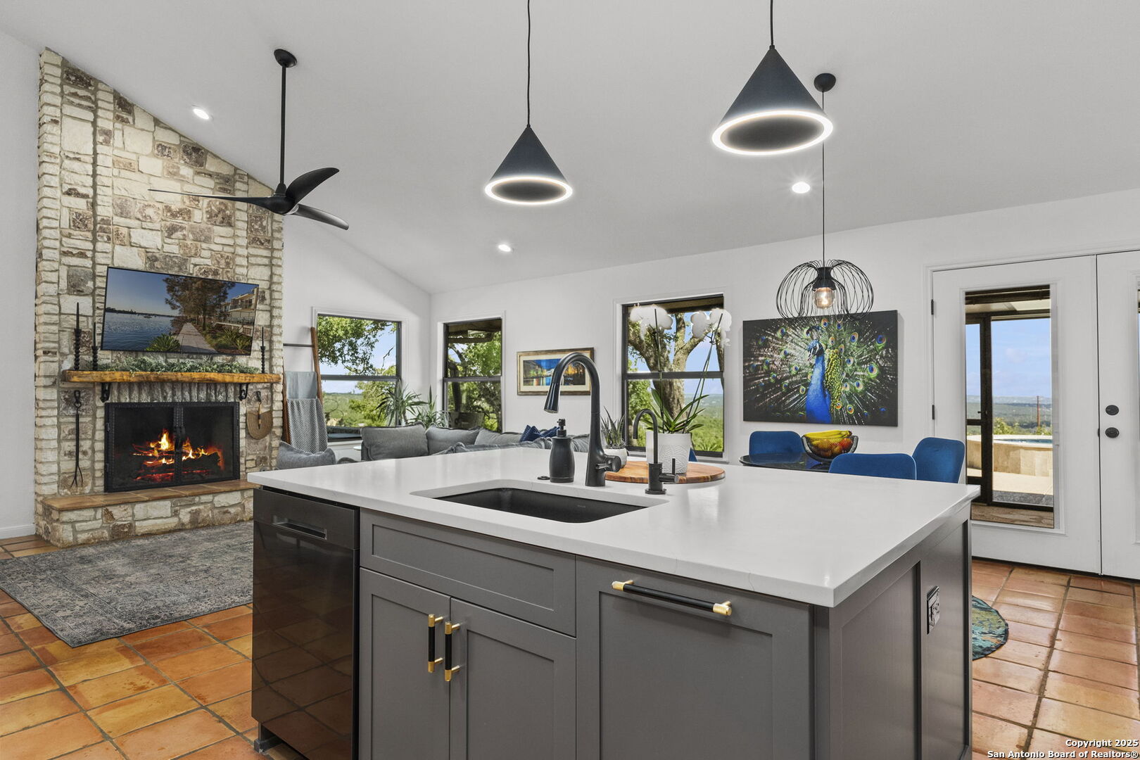 26938 Karsch Road Boerne, TX 78006 - Photo 10 of 60 a kitchen with a counter space a sink appliances and a window