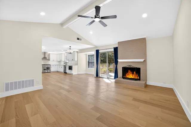 a bedroom with a bed and a table in it