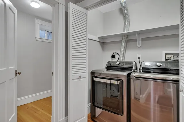 a kitchen with stainless steel appliances granite countertop a stove and a refrigerator