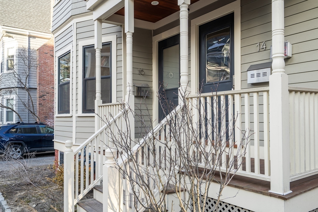 16 Traymore Street, Unit 16 Cambridge, MA 02140 - Photo 2 of 22 a view of a brick house with large windows