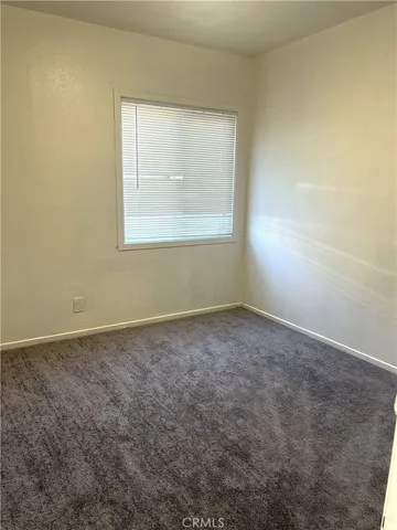 an empty room with window