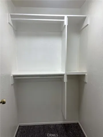 a bathroom with a sink a toilet and a shower