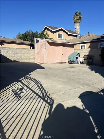 a view of outdoor space with sliding door and wooden floor