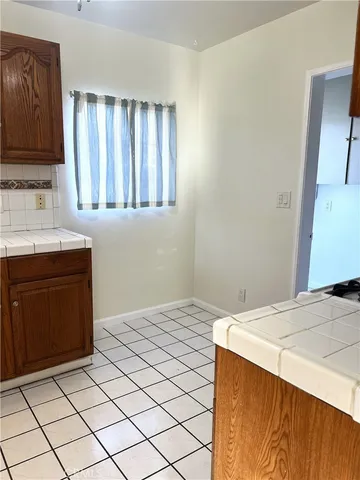 a room with a sink and a mirror