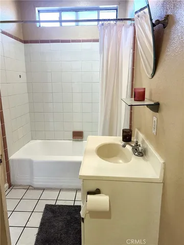 a bathroom with a sink and a bathtub