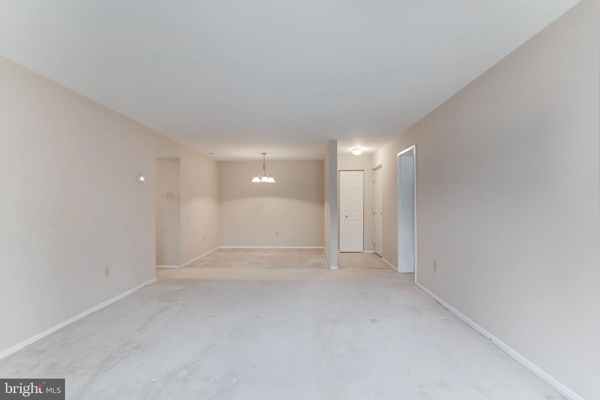 2570 Riva Road, Unit 13C Annapolis, MD 21401 - Photo 5 of 24 Living room looking to entry foyer and dining room