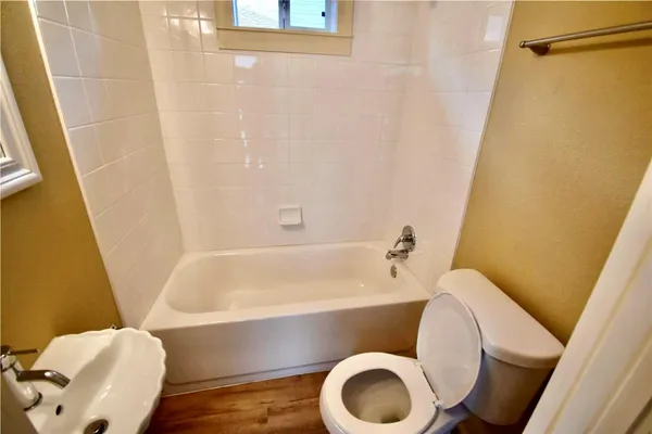 a bathroom with a sink and a bathtub