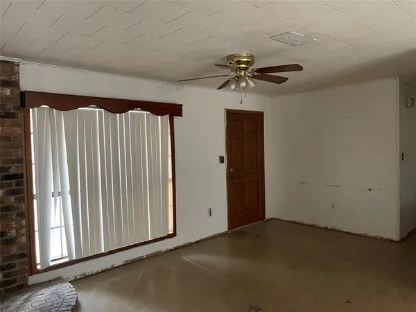 a view of a livingroom with a staircase