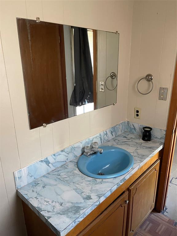 270 Layfield Road Coushatta, LA 71019 - Photo 22 of 22 a bathroom with a sink and a mirror