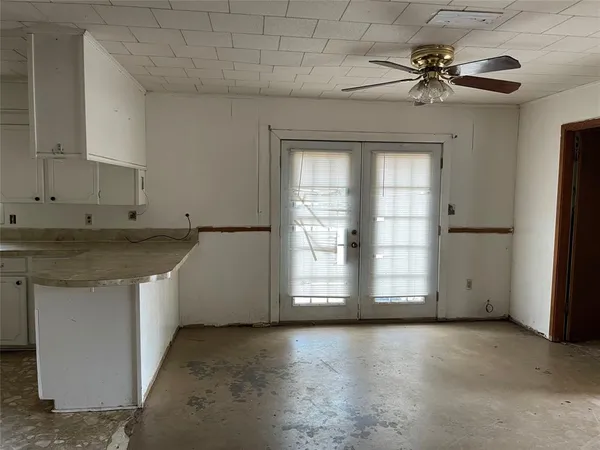 a view of a kitchen with a sink and dishwasher