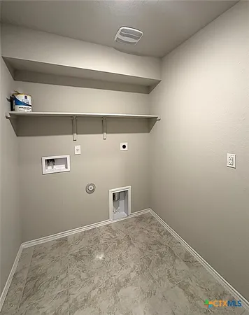 a view of a storage & utility room with closet