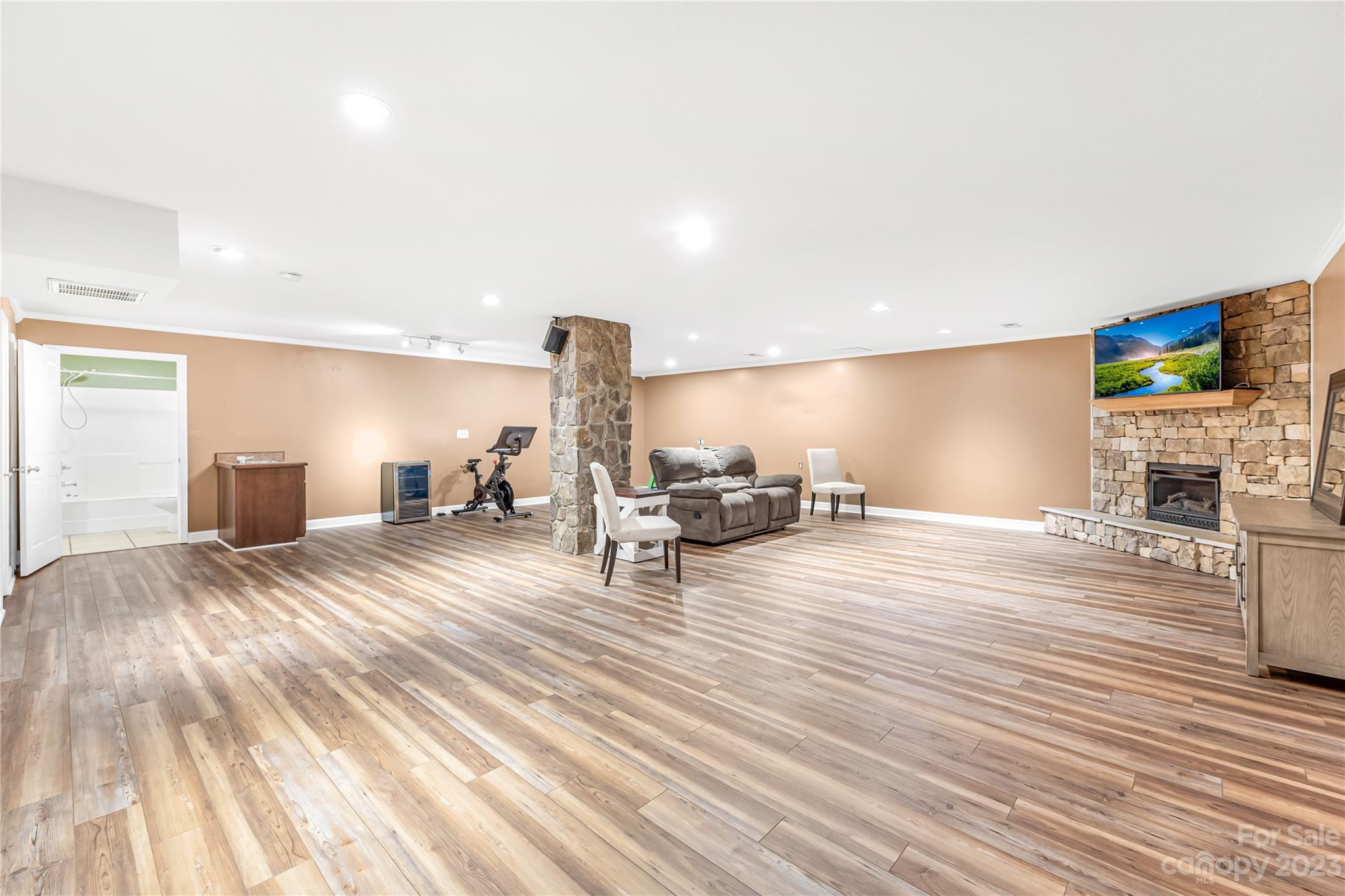 1463 Brookstone Drive Hickory, NC 28602 - Photo 20 of 40 a living room with furniture and a flat screen tv