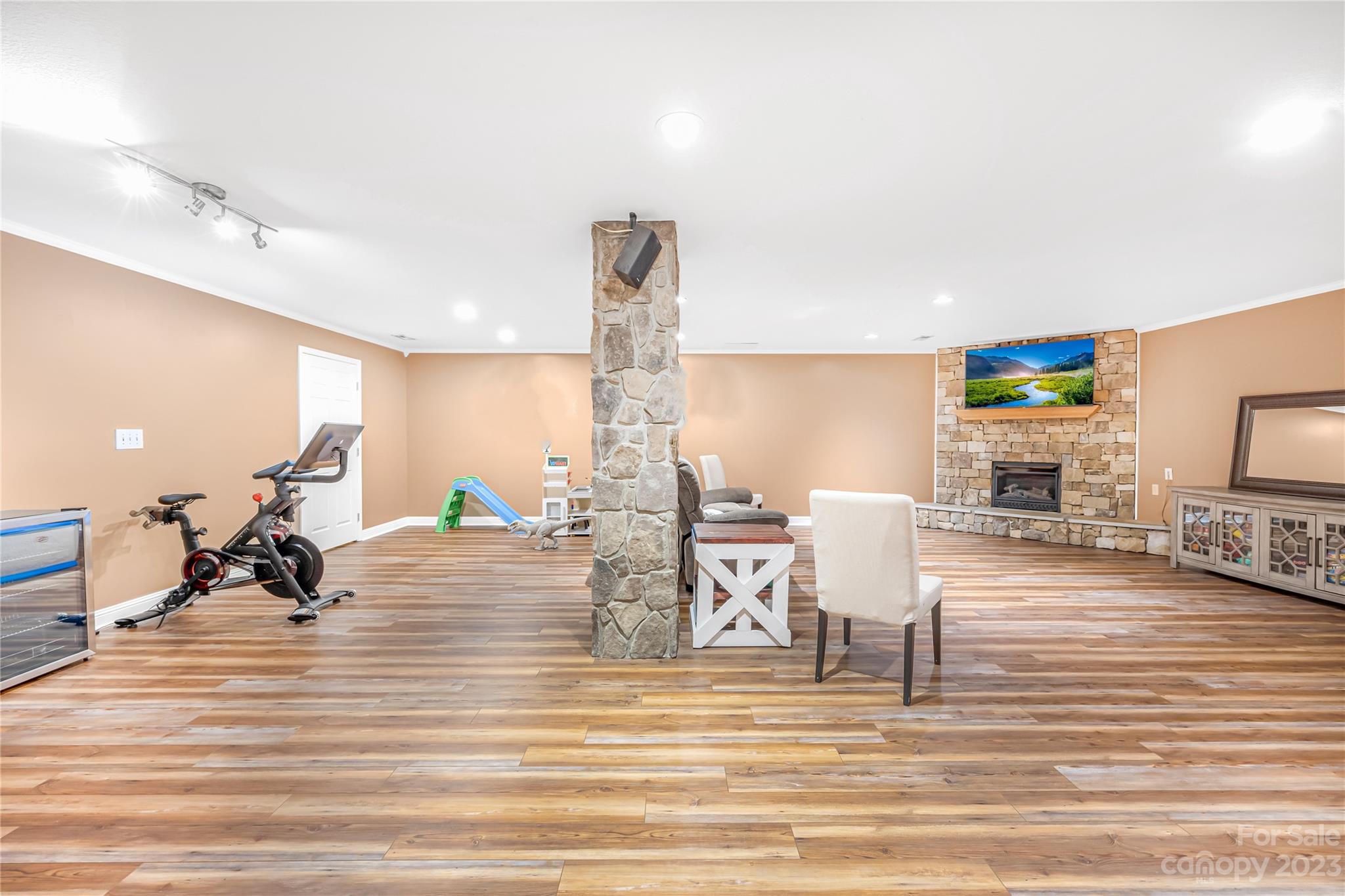 1463 Brookstone Drive Hickory, NC 28602 - Photo 21 of 40 a living room with furniture and a wooden floor