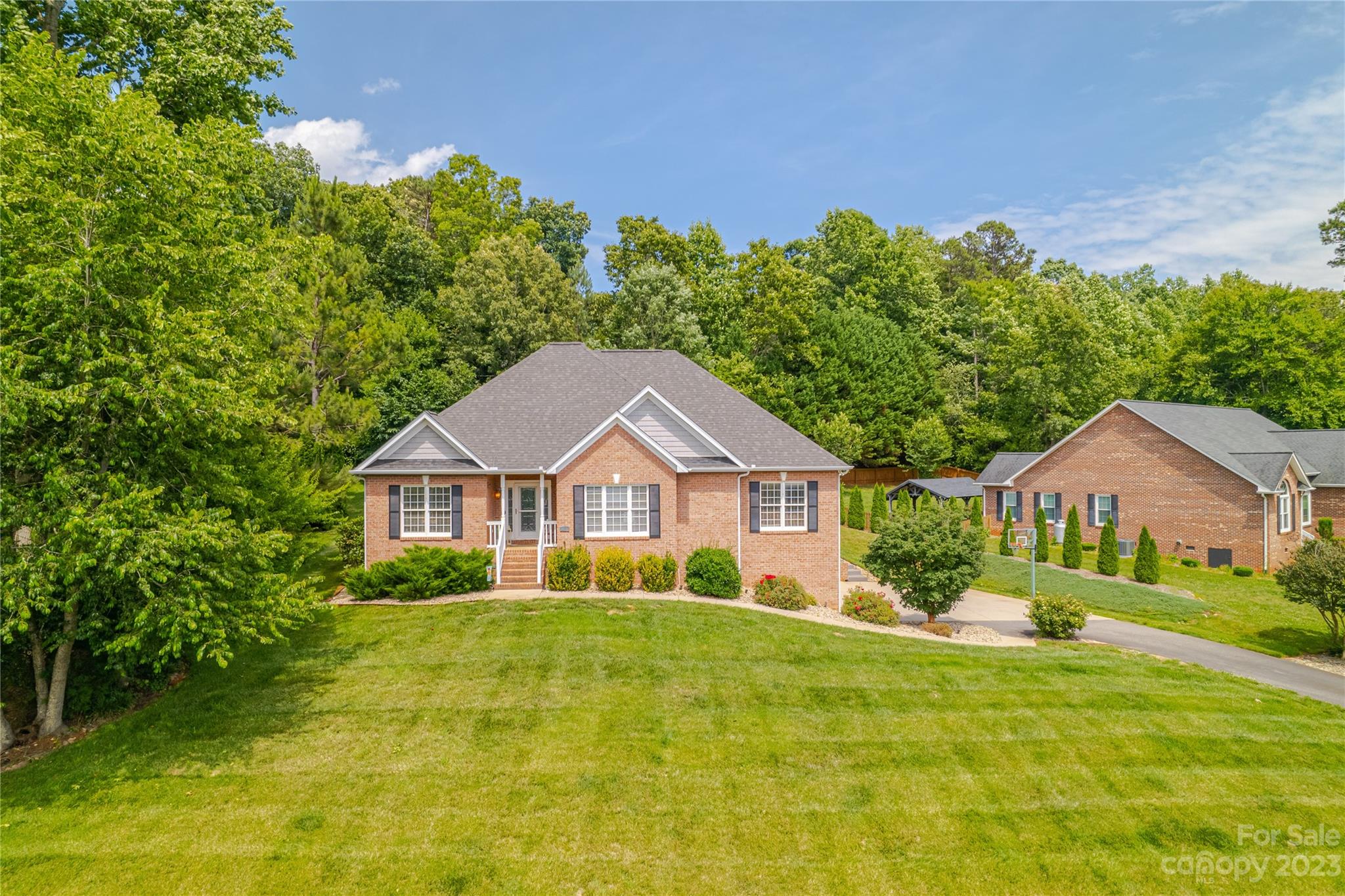 1463 Brookstone Drive Hickory, NC 28602 - Photo 25 of 40 a front view of a house with a yard