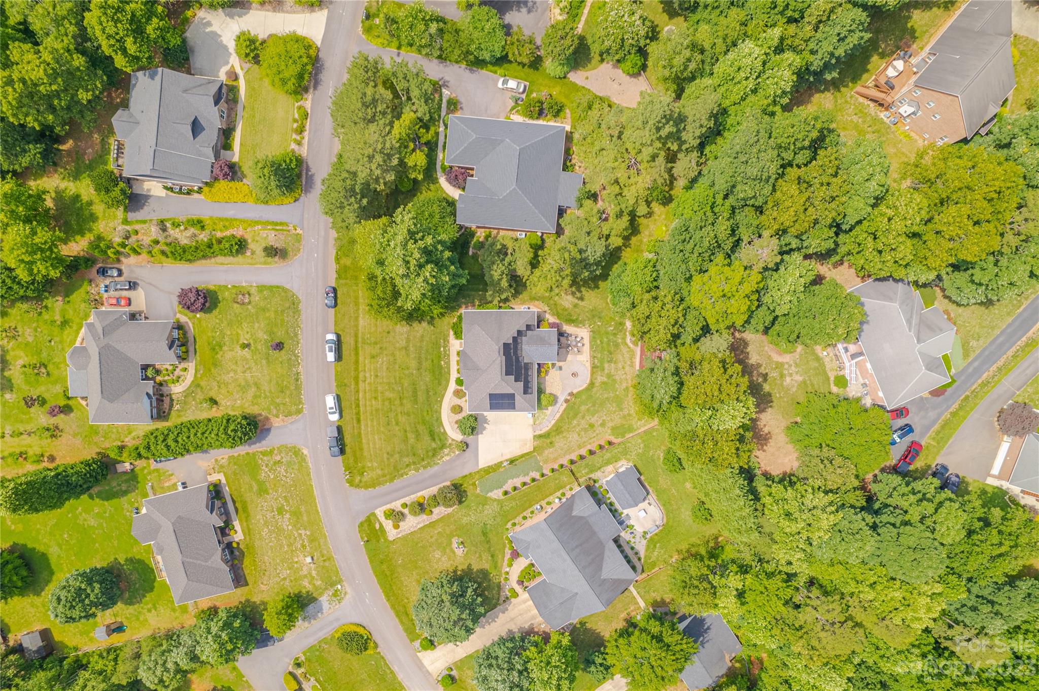 1463 Brookstone Drive Hickory, NC 28602 - Photo 28 of 40 an aerial view of residential house with outdoor space and swimming pool