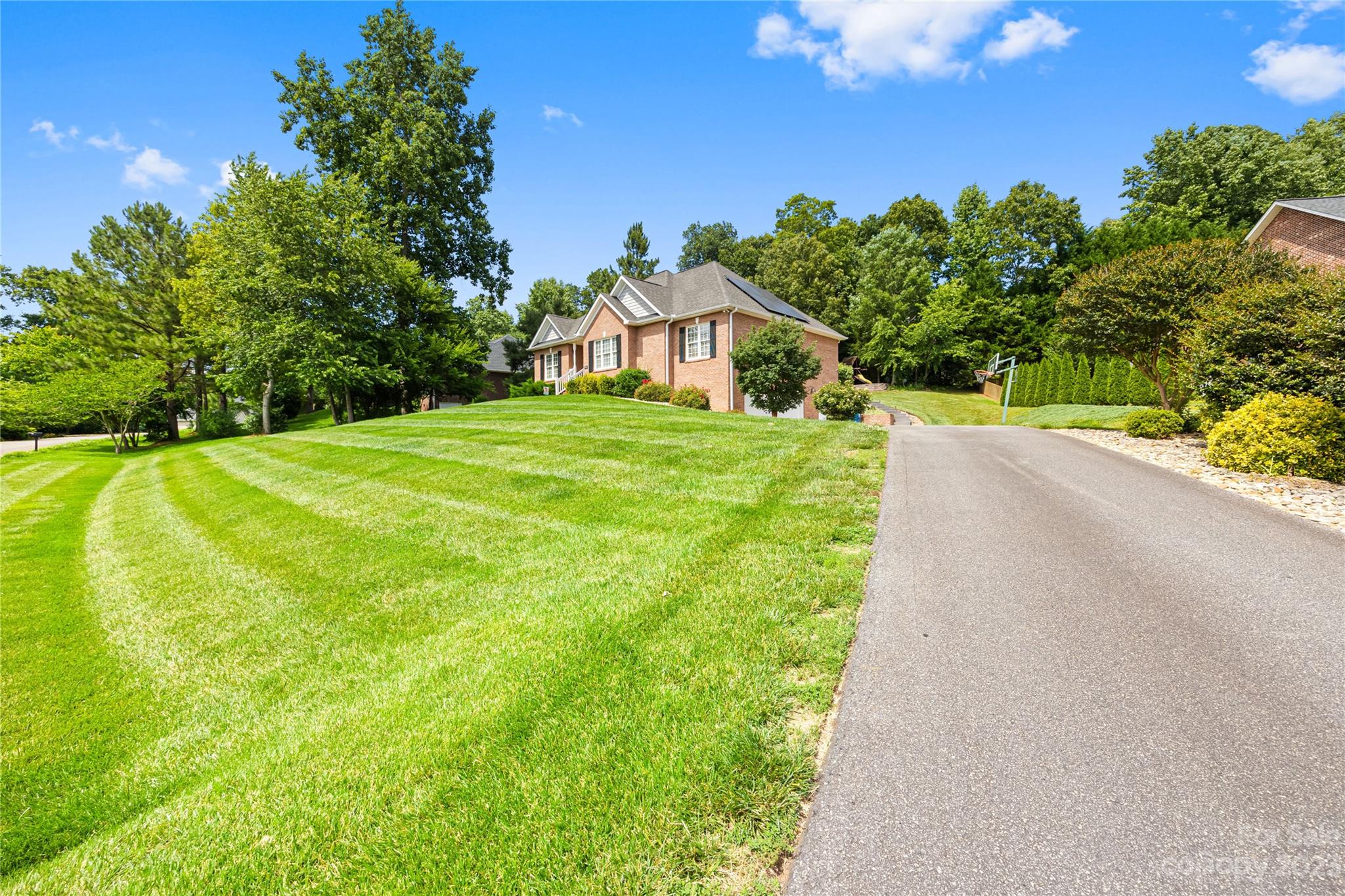1463 Brookstone Drive Hickory, NC 28602 - Photo 35 of 40 a front view of a house with a yard and garage