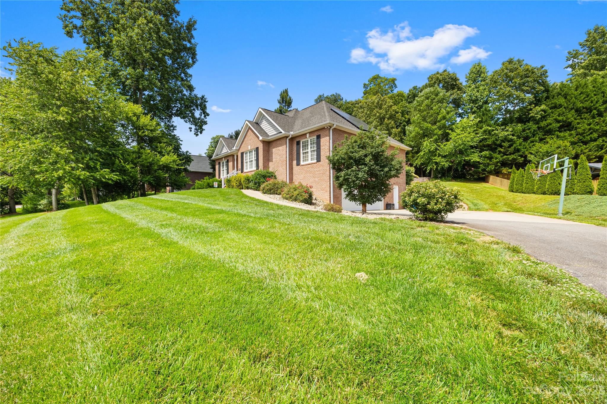 1463 Brookstone Drive Hickory, NC 28602 - Photo 36 of 40 a front view of a house with a yard