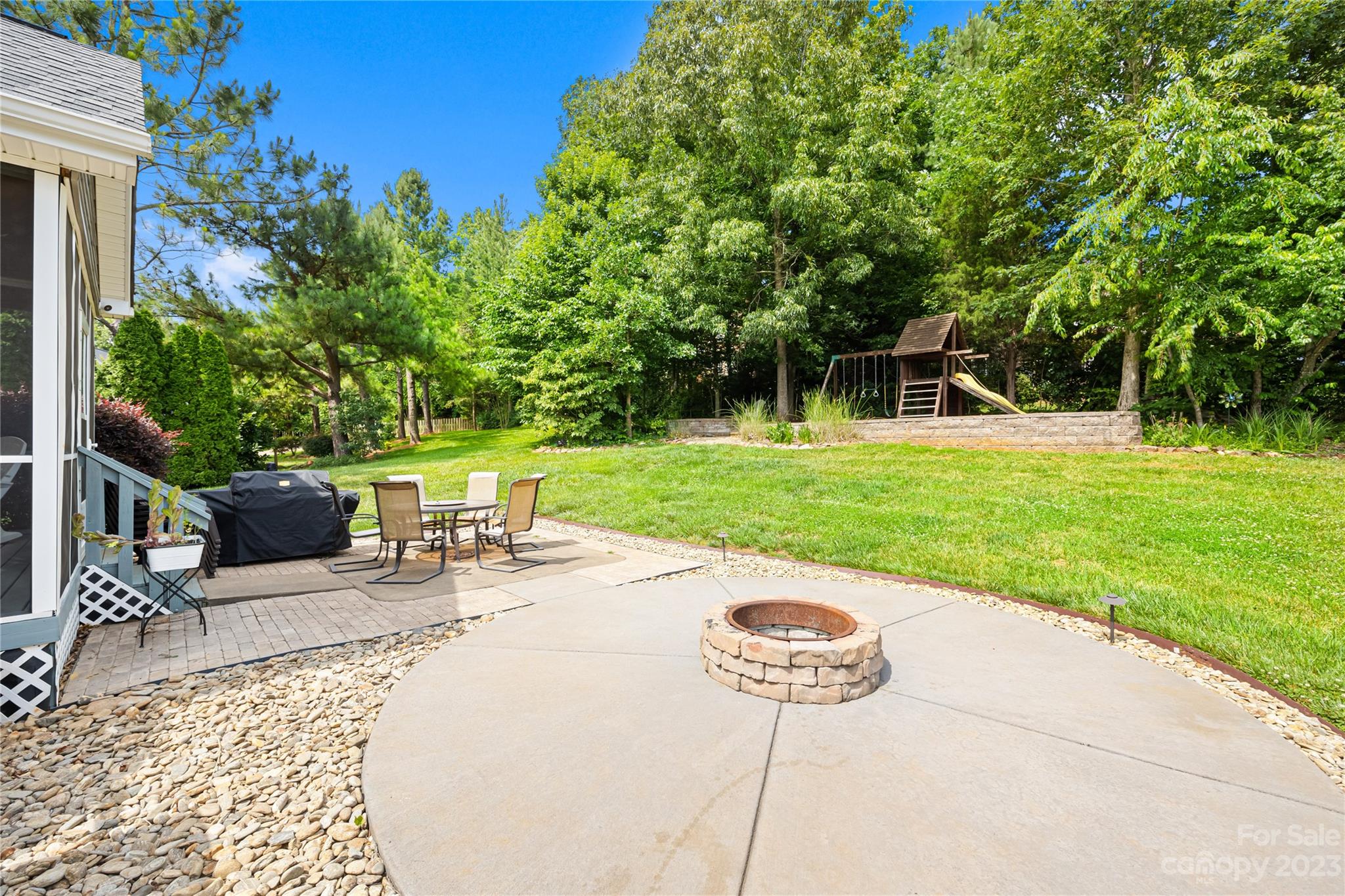1463 Brookstone Drive Hickory, NC 28602 - Photo 40 of 40 a view of a backyard with sitting area