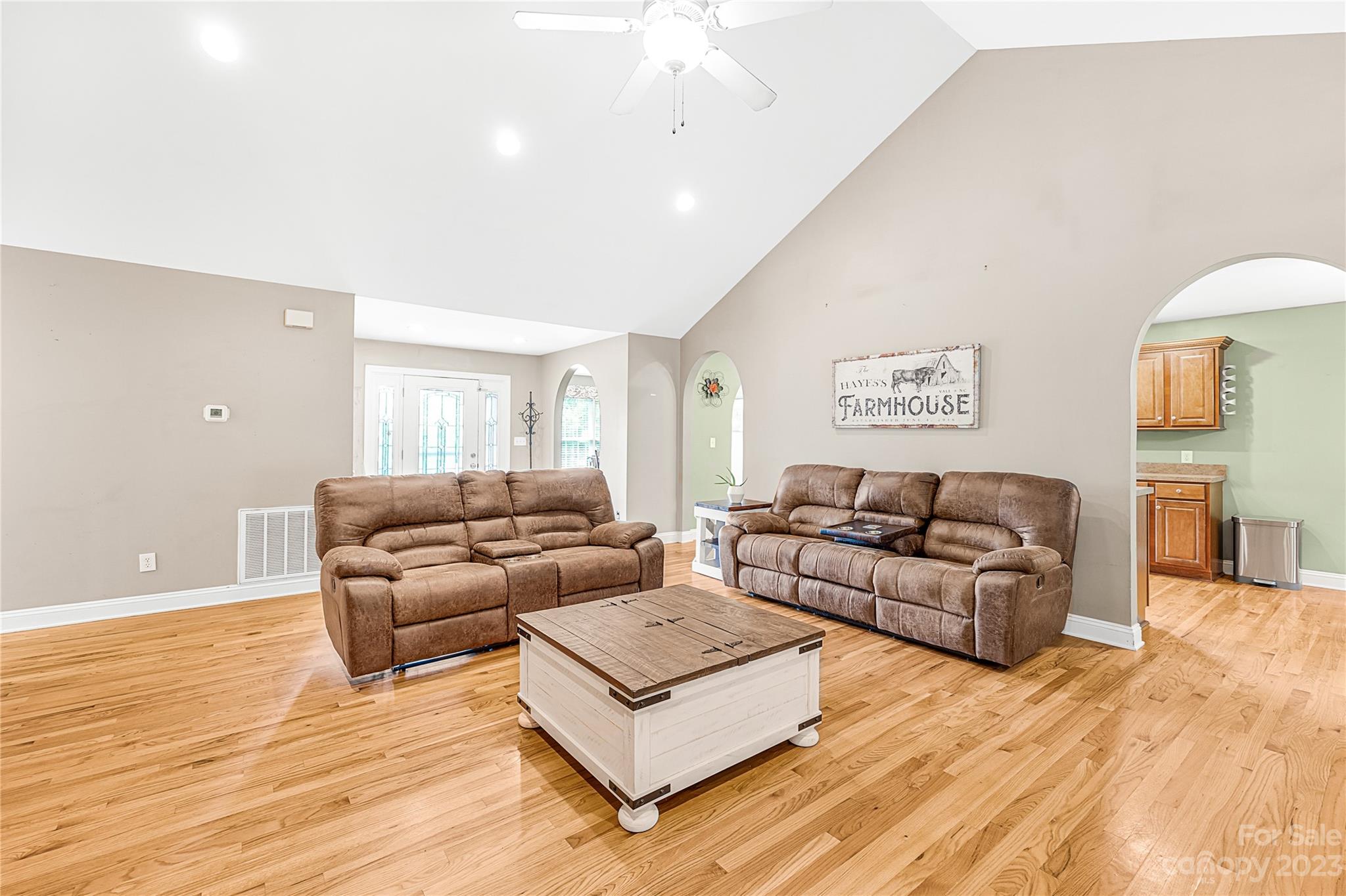 1463 Brookstone Drive Hickory, NC 28602 - Photo 5 of 40 a living room with furniture and a wooden floor