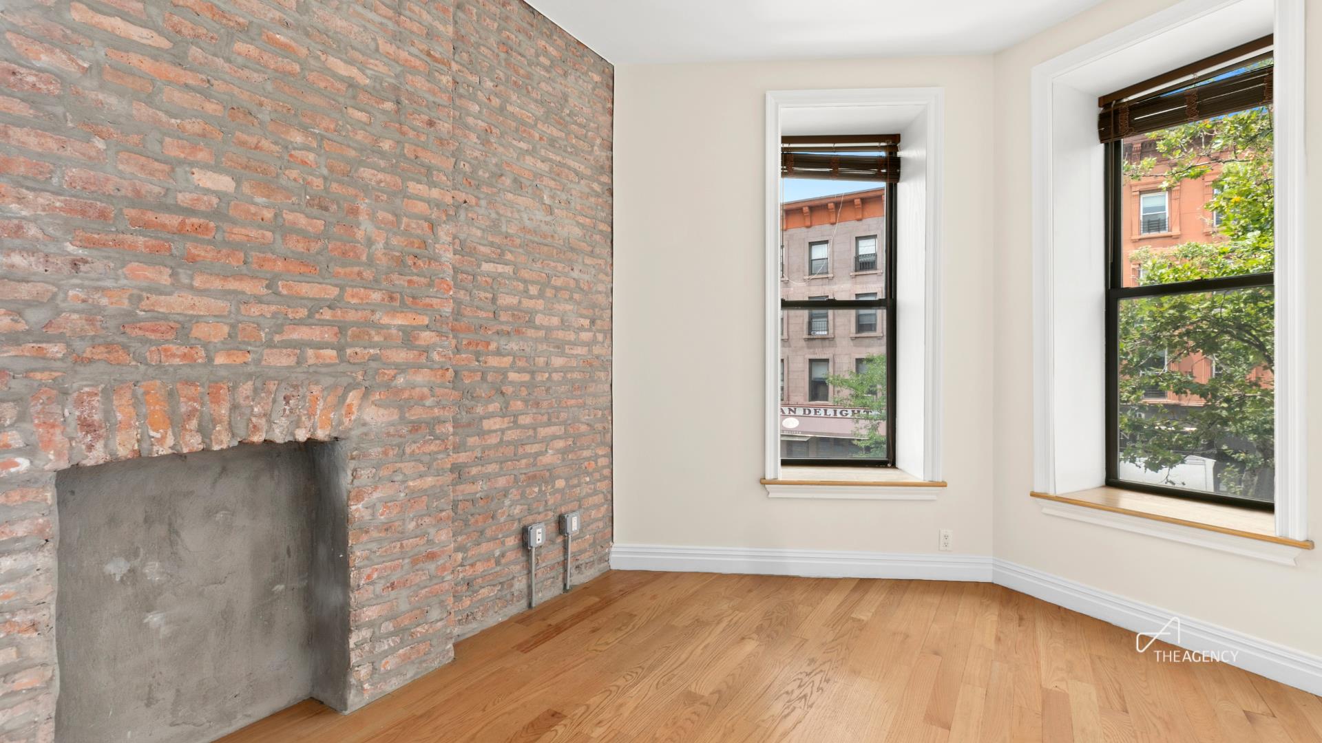 153 7th Avenue, Unit 4 Brooklyn, NY 11215 - Photo 1 of 1 an empty room with windows and closet