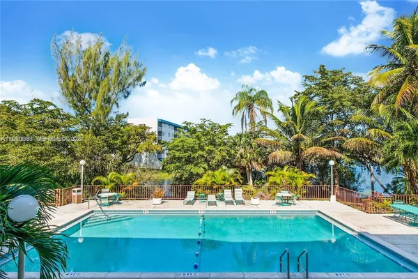 a view of a yard with an outdoor space