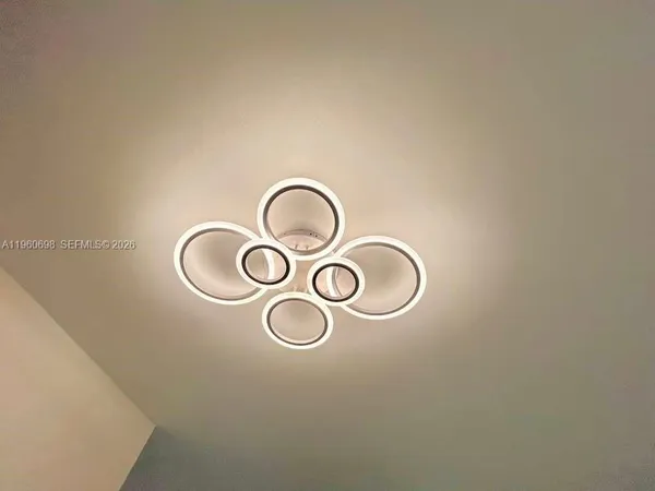 a close up of a light fixture on a wall