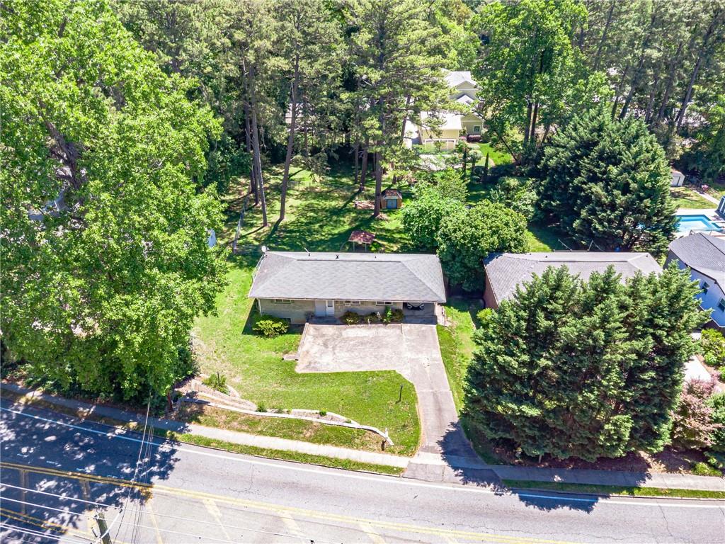 1502 North Druid Hills Road Brookhaven, GA 30319 - Photo 3 of 46 front view of house with yard