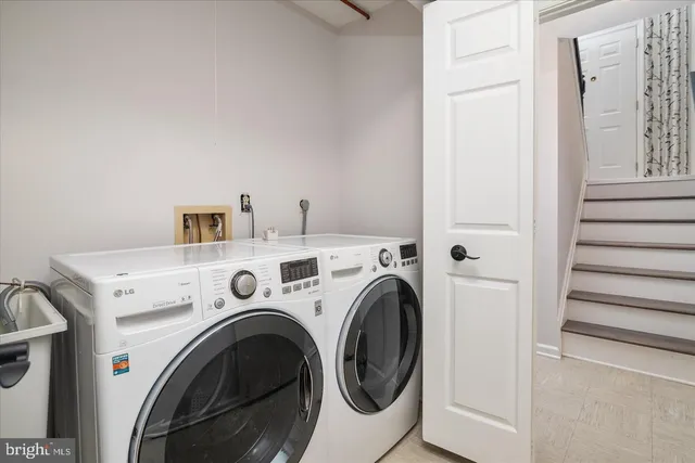 a view of washer and dryer in a utility room