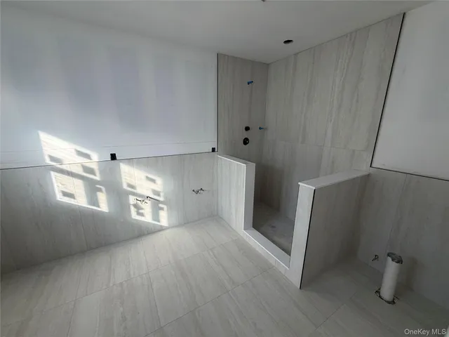 a view of empty room with windows