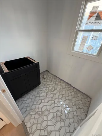 a bathroom with a tub and a shower