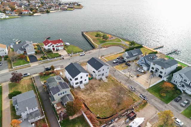an aerial view of a house with outdoor space