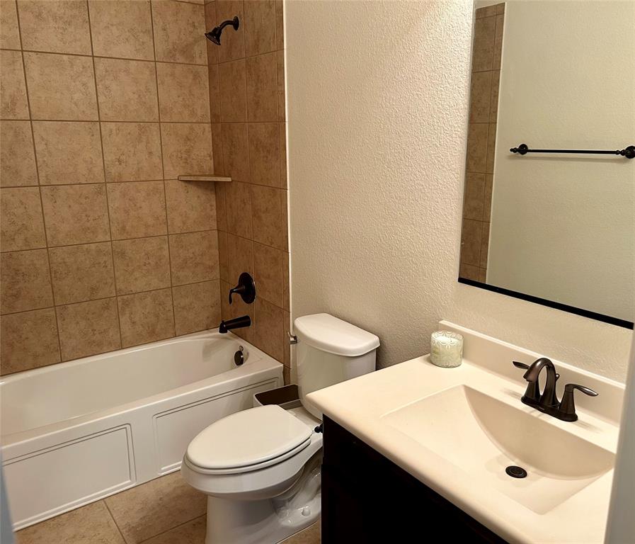 16117 Harper Road Prosper, TX 75078 - Photo 4 of 8 a bathroom with a sink and a toilet