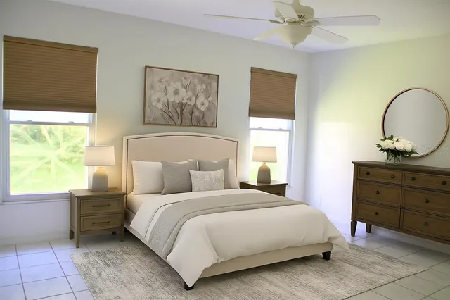 a bedroom with a bed and a dresser