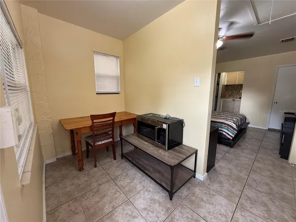 a bedroom with furniture and a bed