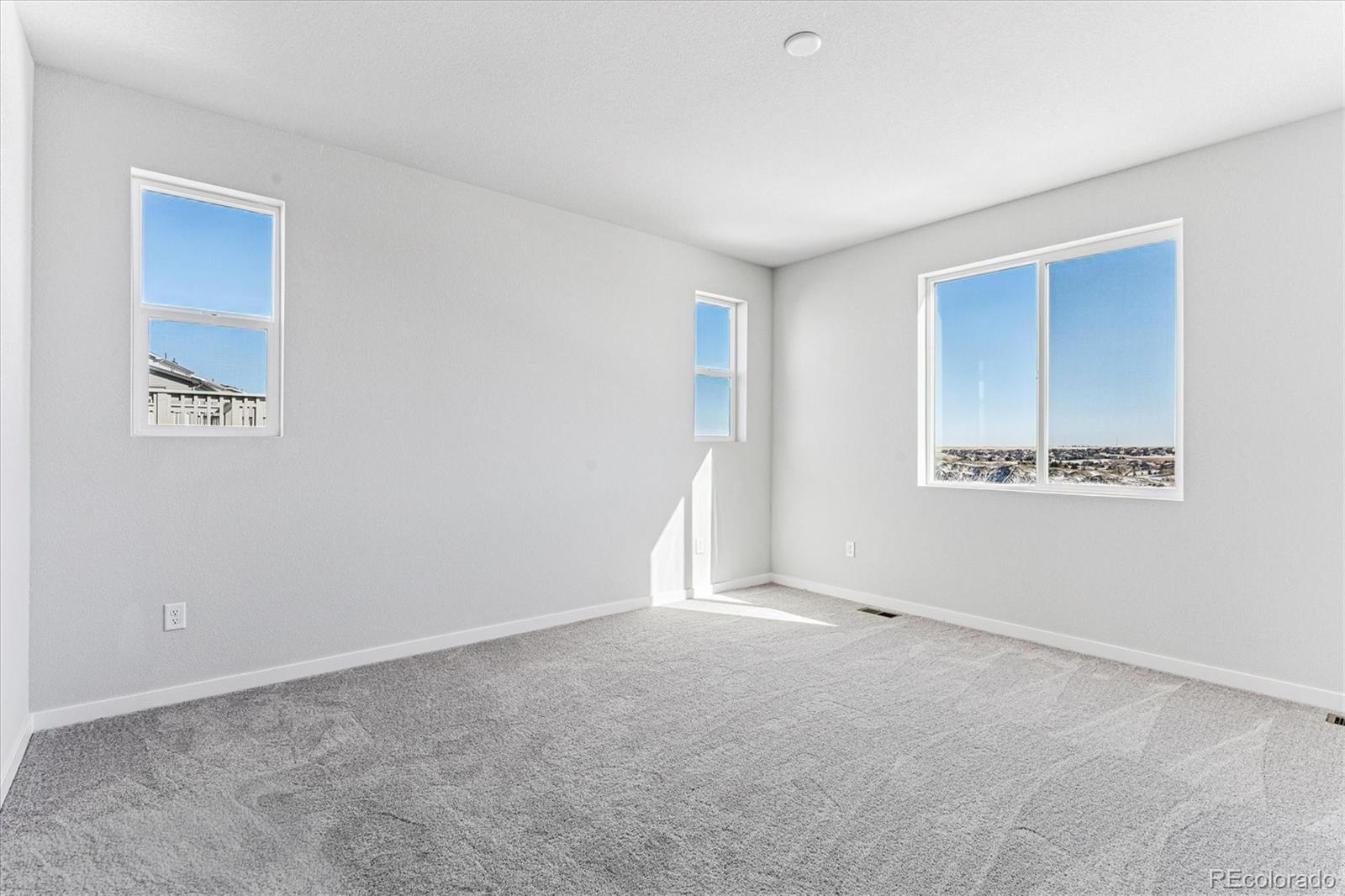 4224 Gozzer Ranch Drive Elizabeth, CO 80107 - Photo 13 of 21 a view of an empty room with a window