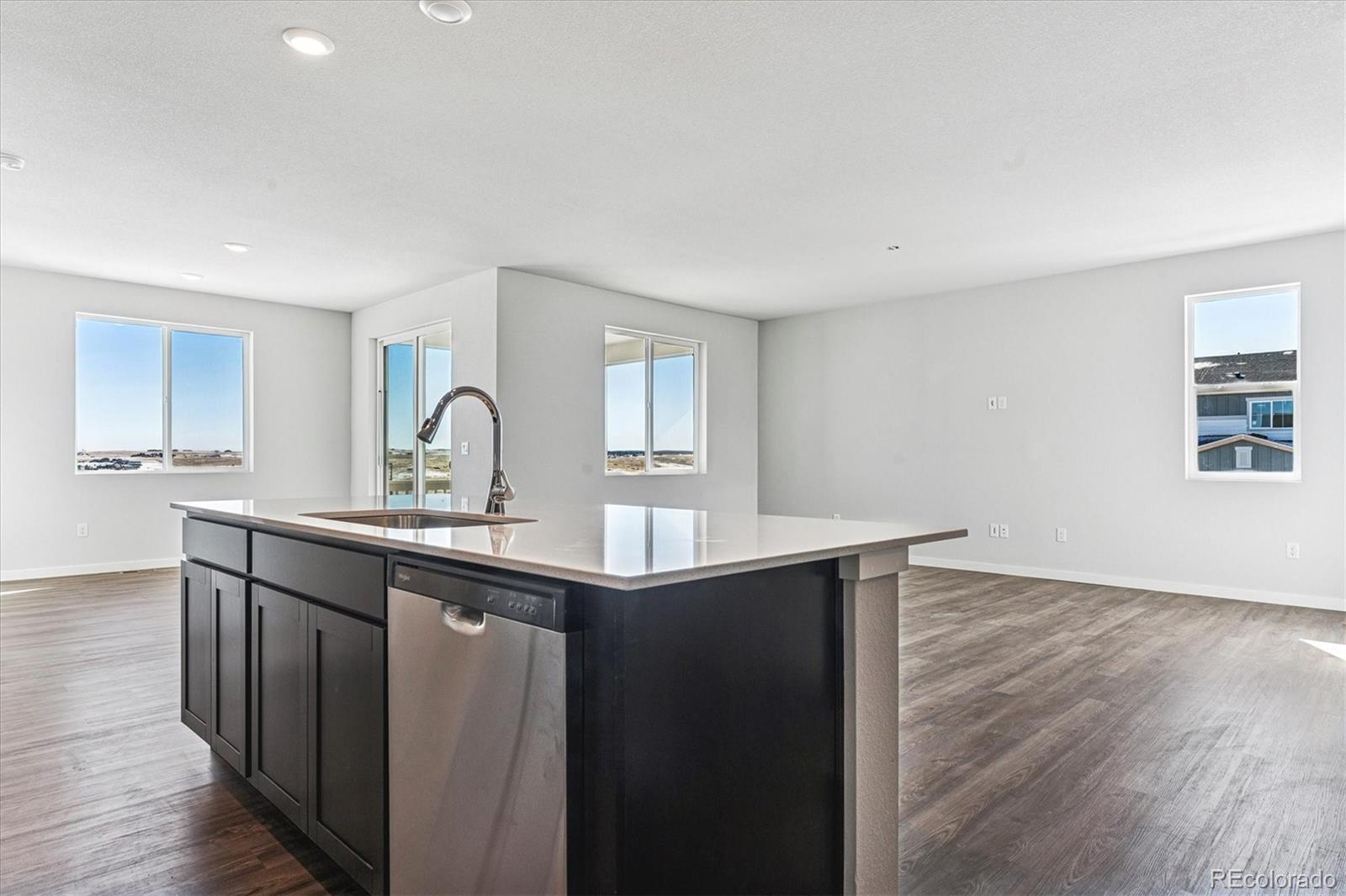 4224 Gozzer Ranch Drive Elizabeth, CO 80107 - Photo 6 of 21 a kitchen with sink and window