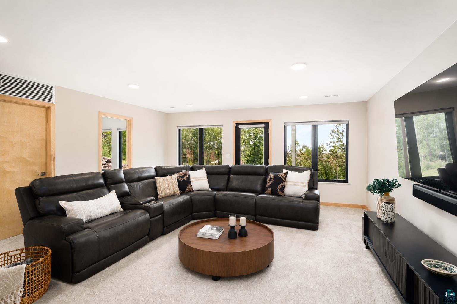 814 Pleasant View Road Duluth, MN 55803 - Photo 29 of 49 Spacious recreation room featuring light-toned carpeting and recessed lighting