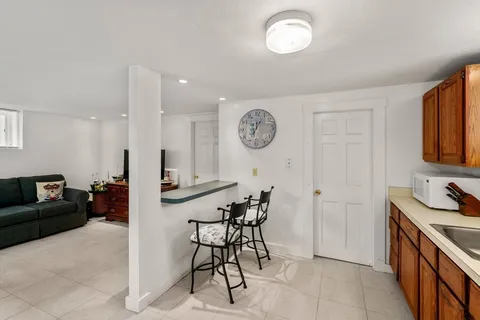 a view of a kitchen cabinets and dining room
