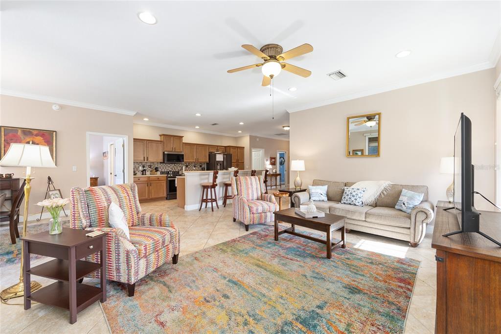 3304 Southwest 38th Street Ocala, FL 34474 - Photo 14 of 21 a living room with furniture and kitchen view