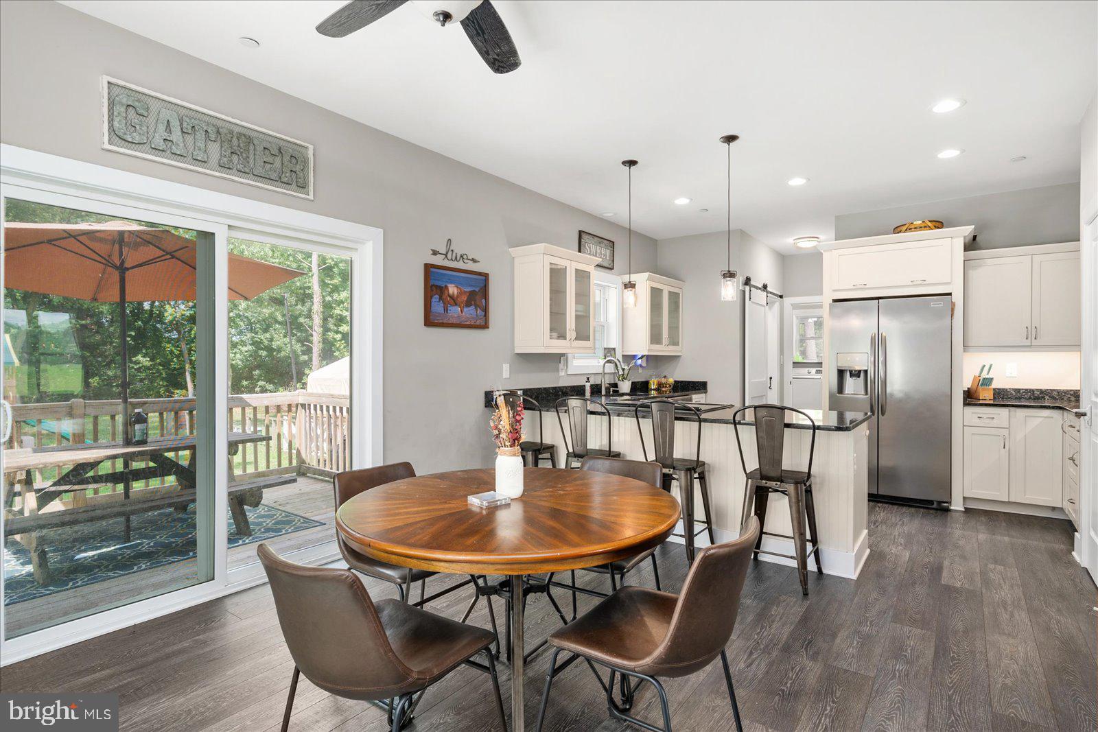 6996 Powellville Road Willards, MD 21874 - Photo 17 of 61 Open kitchen and dining area