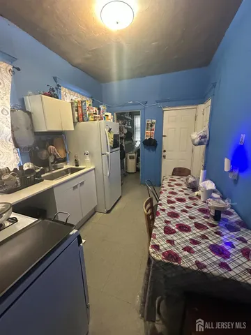 a bedroom with a bed and dresser